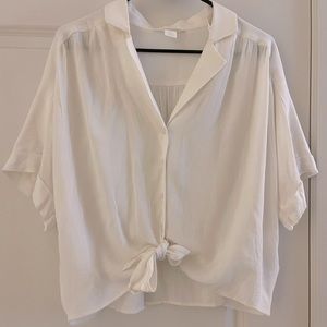 Cream colored front tie button down linen blouse